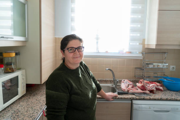 istock Mature woman working in the kitchen 1206750624