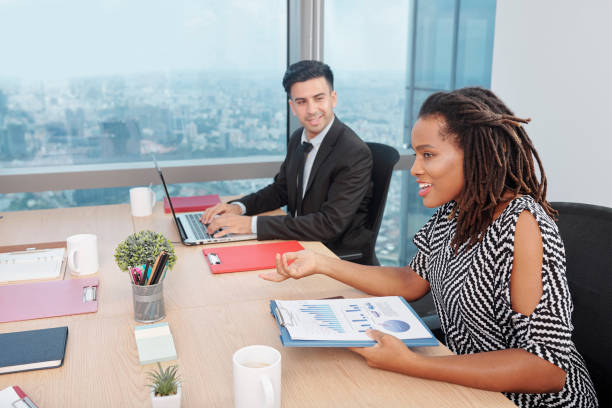 istock Businesswoman talking about sales growth 1206753789