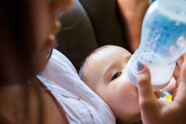 istock Baby boy and young mother 1206756484