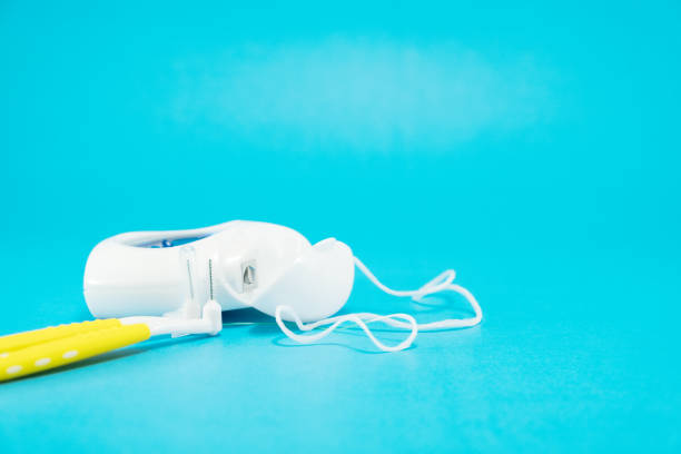 istock dental floss and interdental brush. 1206761574