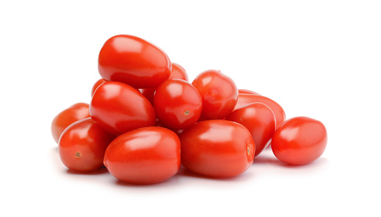 Pile of cherry tomatoes isolated on white background