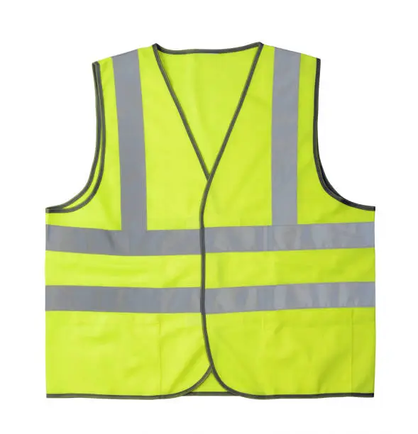 Photo of Yellow reflective vest isolated on white