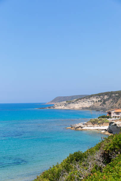 istock Sandy beach with blue water and a gentle entrance to Sardinia 1206764355