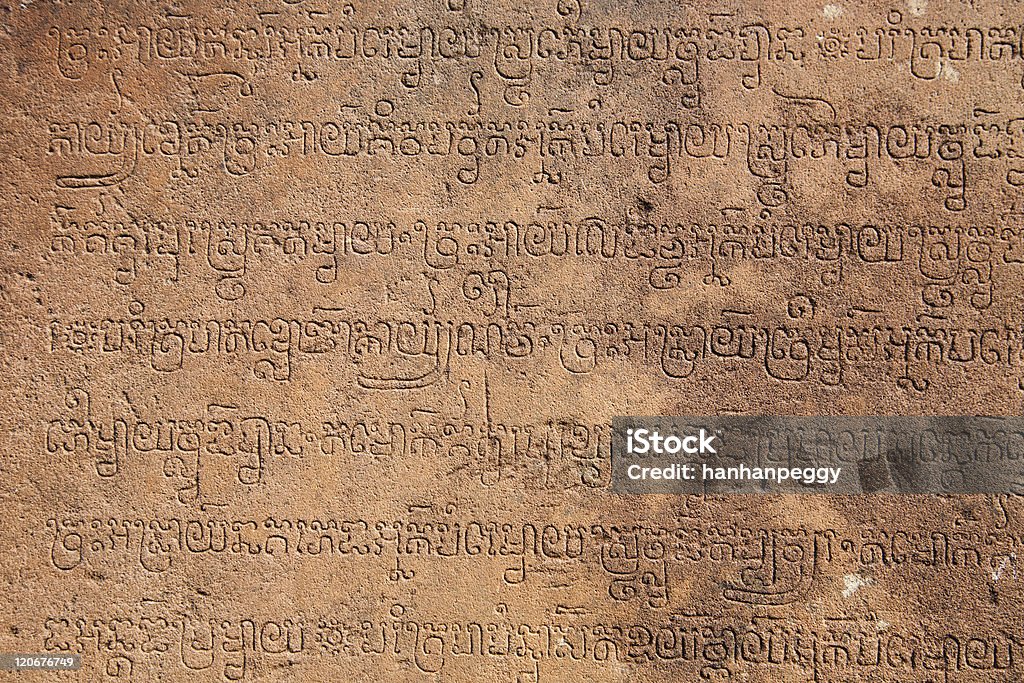 Carattere antico khmer di Angkor Wat - Foto stock royalty-free di Angkor Wat