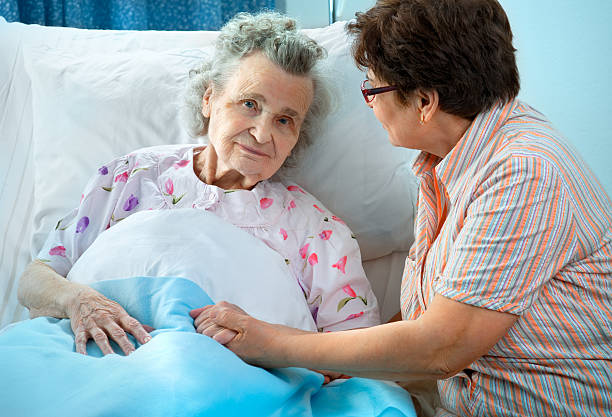 istock A daughter taking care of her elderly mother 120676971
