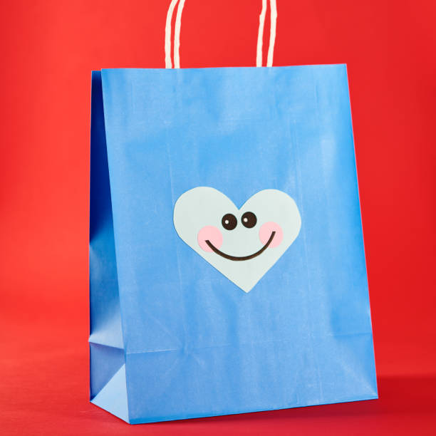 istock Shopping Bag with Cute Character Emoticon Face 1206771547