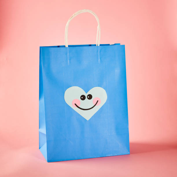 istock Shopping Bag with Cute Character Emoticon Face 1206771681