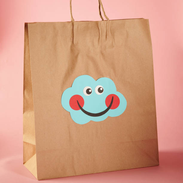 istock Shopping Bag with Cute Character Emoticon Face 1206771821