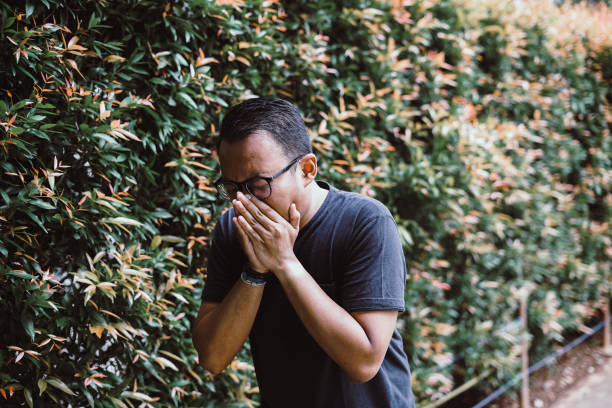 istock Southeast Asia Man - Coughing 1206773042