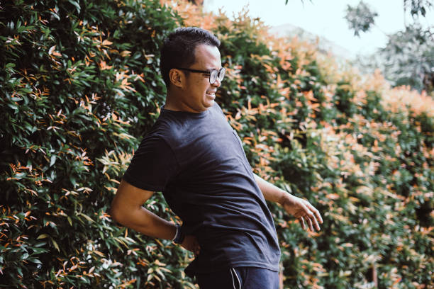 istock Southeast Asia Man - Back Pain 1206773118