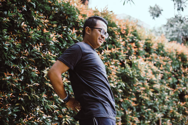 istock Southeast Asia Man - Back Pain 1206773175