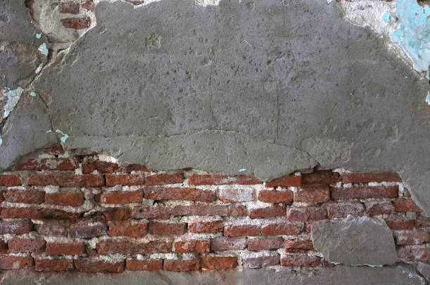 istock Grunge background, red brick wall texture bright plaster wall and blocks road , Concept sidewalk abandoned exterior urban 1206774421