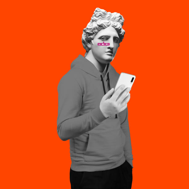 istock Social network .Modern art collage. Concept portrait of a man  holding mobile smartphone using app texting message. Gypsum head of of Apollo. Man in suit. On a blue background. 1206775576