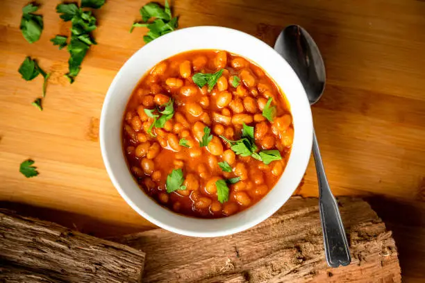Photo of Baked Barbecue BBQ Texas Style Beans for Dinner or Lunch plated Food Photography