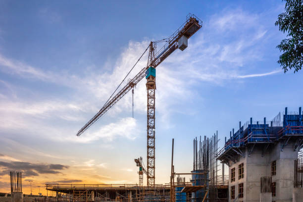 istock Two cranes at a mall building site 1206779032