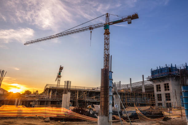 istock Two cranes at a mall building site 1206779048