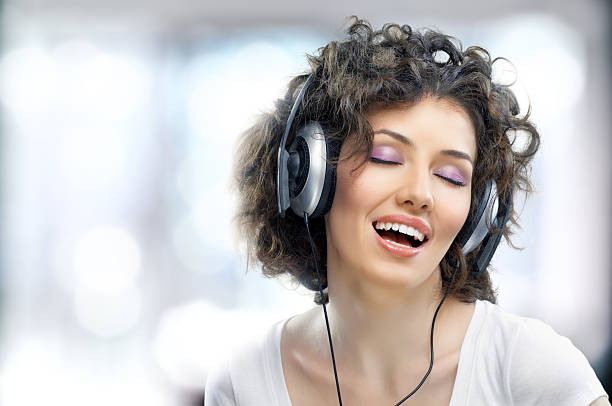 istock girl with headphones 120677936