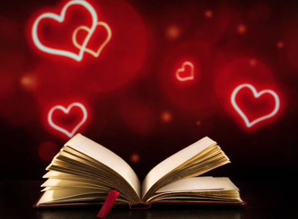 istock open diary on a beautiful black-red background with hearts 1206780713