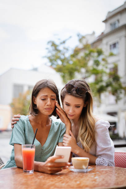 istock Desperate woman getting support from her best friend 1206781333