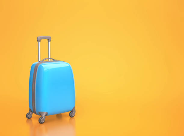 istock Blue travel suitcase on orange background with copy space 1206781438