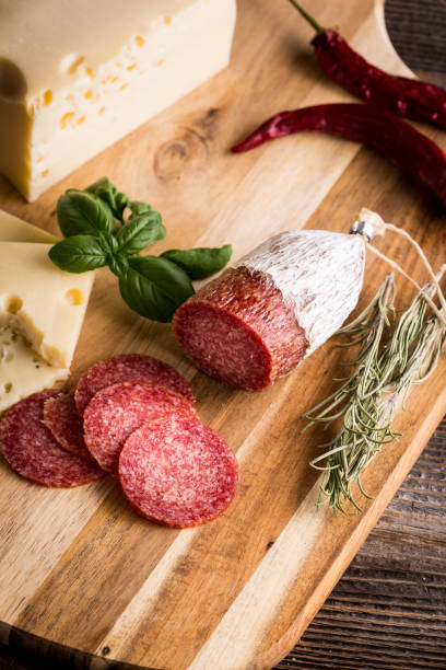 istock Dry salami or sausage with cheese 1206781569
