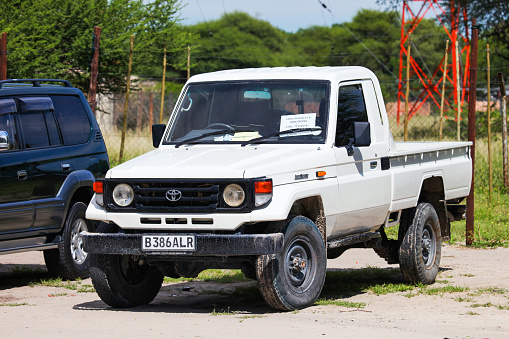 Jandia, Fuerteventura, Spain, November 27, 2023 - A white Volkswagen T-Roc Cabriolet with the top down.