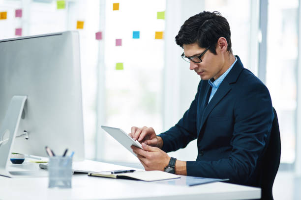istock Perfecting his plans with the help of modern tech 1206781797