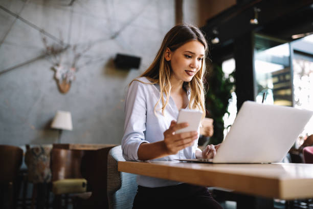 istock Happy young beautiful woman working, surfing, studying on laptop 1206782964
