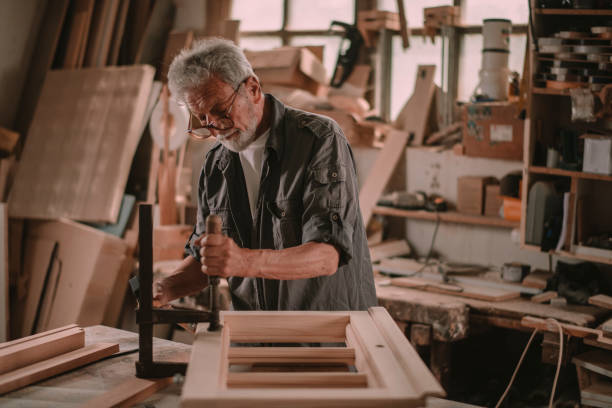 istock Mature carpenter at work stock photo 1206784733
