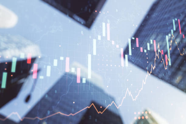 istock Double exposure of abstract financial graph with world map on office buildings background, financial and trading concept 1206786962