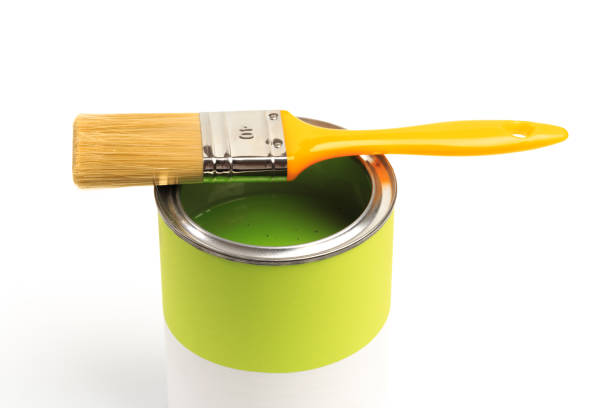 istock Can with green paint with brush  isolated on white background - Image 1206788225