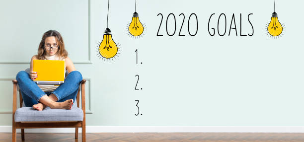 istock 2020 goals with young business woman 1206788492