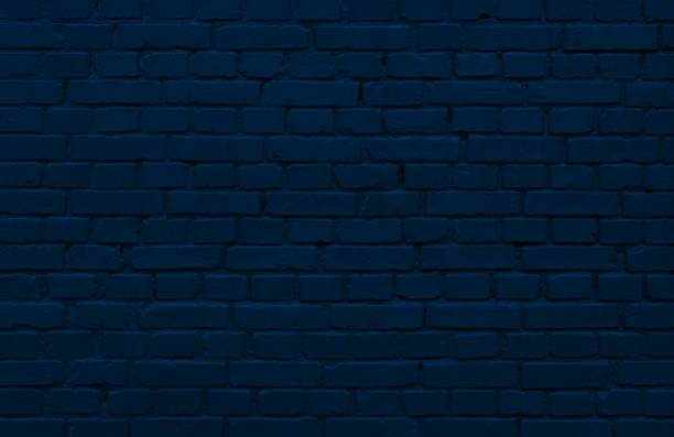 istock blue brick wall with layer of paint 1206791357