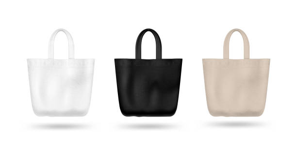 istock Realistic  textile tote bag vector mockup set. Black and white and biege. Isolated on white background. 1206791573