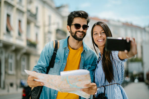 istock Happy couple exploring stock photo 1206791996