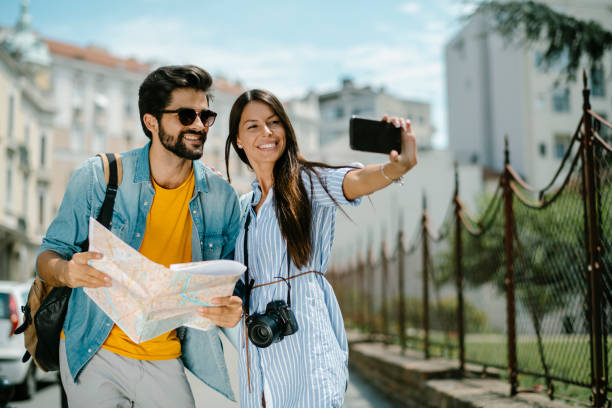 istock Happy couple exploring stock photo 1206792065