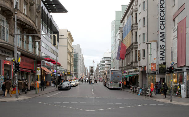 istock Berlin, Germany - December 20, 2019: People visit famous Checkpoint Charlie in Berlin. During the Cold War it was the best known crossing of Berlin Wall 1206792635