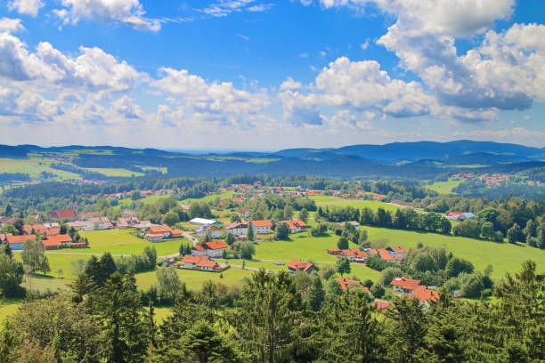 istock Clouds over a green valley in Bavaria. 1206793186