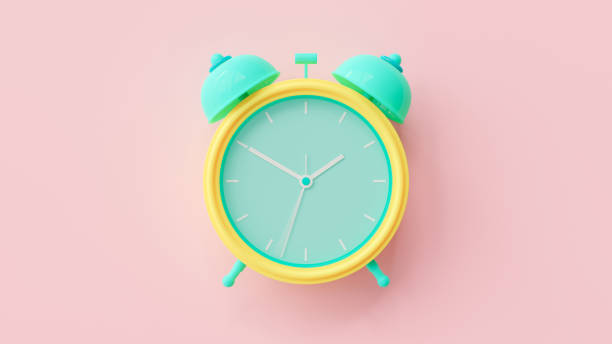 istock Alarm clock green and yellow color with clipping path 1206793279