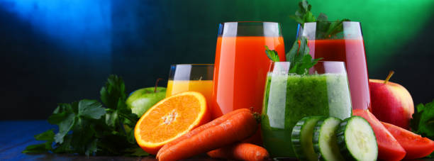 istock Glasses with fresh organic vegetable and fruit juices 1206794716