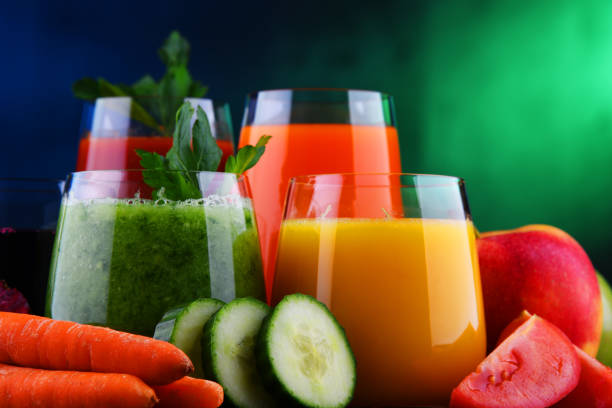 istock Glasses with fresh organic vegetable and fruit juices 1206794834