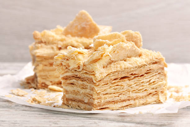 istock Two pieces of sweet layer cake. 1206797462