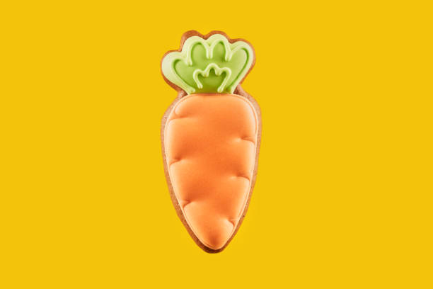 istock Easter carrot cookie decorated with green and orange glaze 1206798644