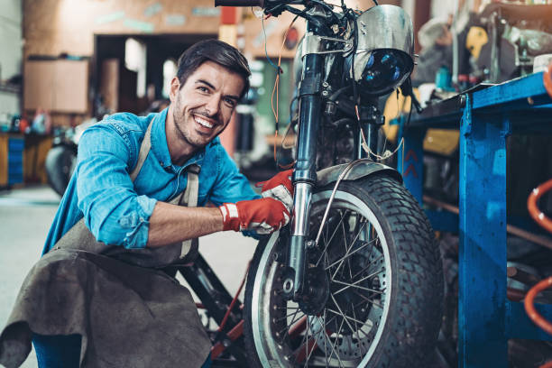 istock Young man repairing a motorcycle 1206799088