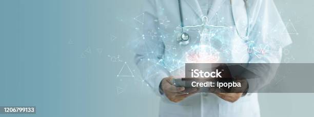 Medicine Doctor Holding Electronic Medical Record On Tablet Brain Testing Result Dna Digital Healthcare And Network Connection On Hologram Interface Science Medical Technology And Networking Stock Photo - Download Image Now