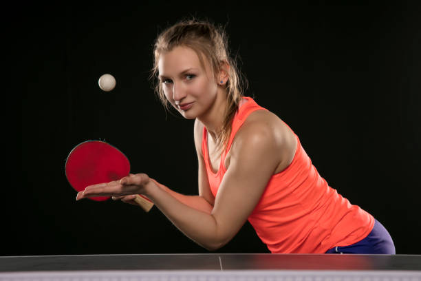 istock young beautiful athletic girl playing ping pong 1206803777