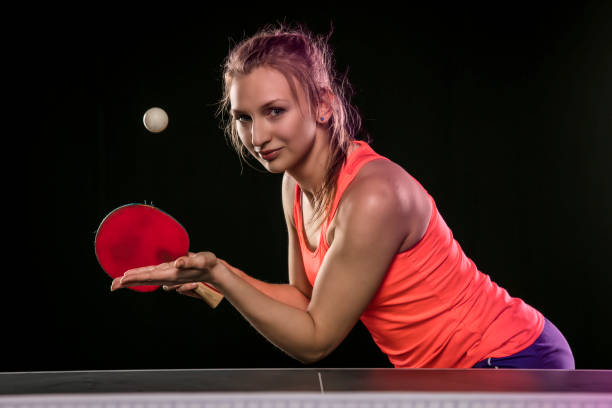 istock young beautiful athletic girl playing ping pong 1206803797