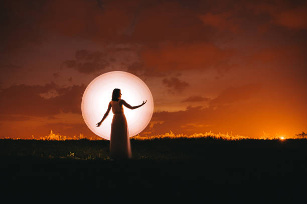 istock Woman and moon 1206805038