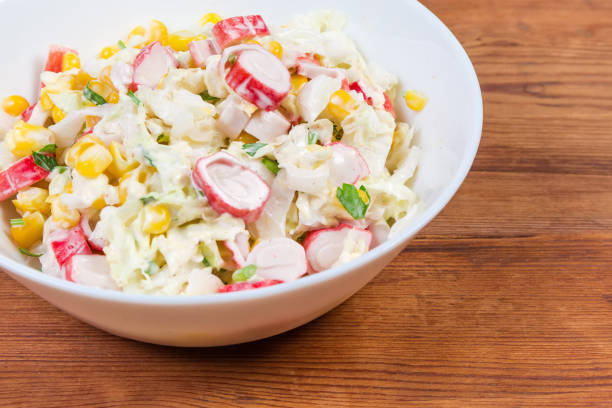 istock Salad of crab sticks with vegetables closeup in selective focus 1206808254