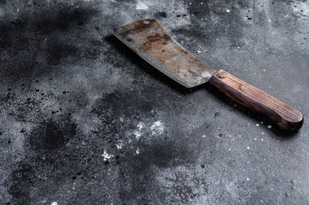 istock Vintage butcher cleaver with wooden handle. Black background. Top view. Copy space 1206810708